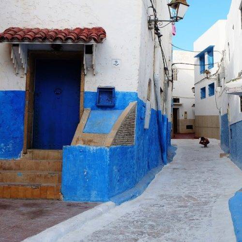 Blue and white alley in Kasbah of the Udayas Rabat during 5 Days Desert Tour From Marrakech To Chefchaouen.